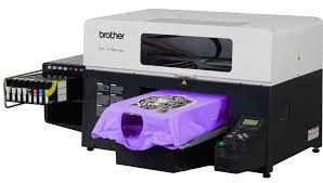 thường dùng máy gì để in lên vải